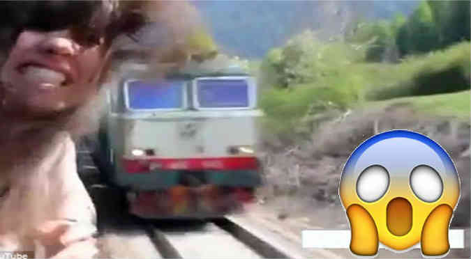YouTube: ¡Asomó su cabeza por la ventana de un tren y quedó así!